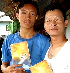 Giving out Bibles in Nepal. Pastor Reuben's already passed out 10,000 booklets of a Nepali tract he wrote before we made contact with him.