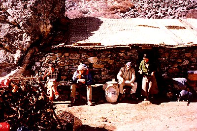 1979 Nepal, the Everest Trek. Food break. Roberto, Pierre, and Ken Street (from left to right). Werner is snapping the photo.